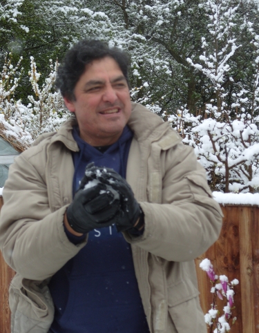 [Photo of MadAlfred making a snowball in London, April 2008]